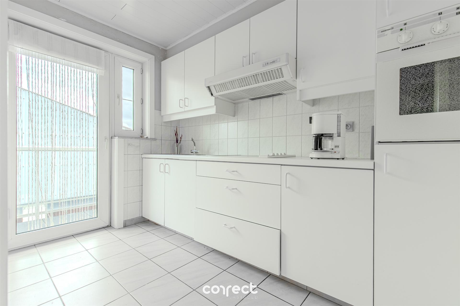 Centraal gelegen, instapklaar appartement met zonneterras en eventueel gesloten garage. foto 4