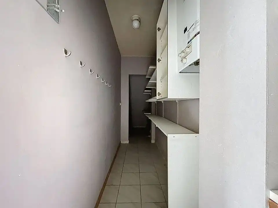 Te renoveren huis te koop in centrum Wuustwezel foto 8