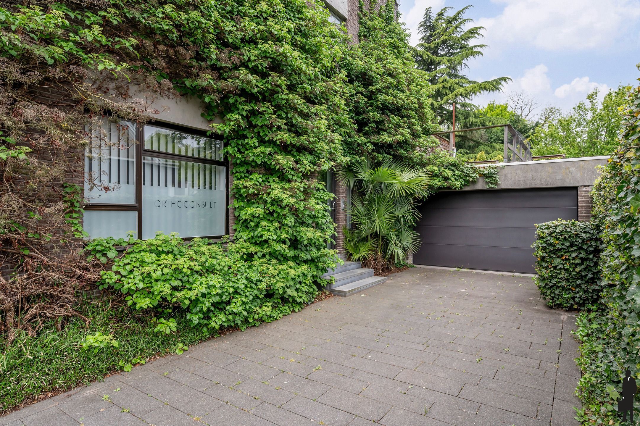 Wonen en werken: woning met praktijk, duplex en tuin! foto 2