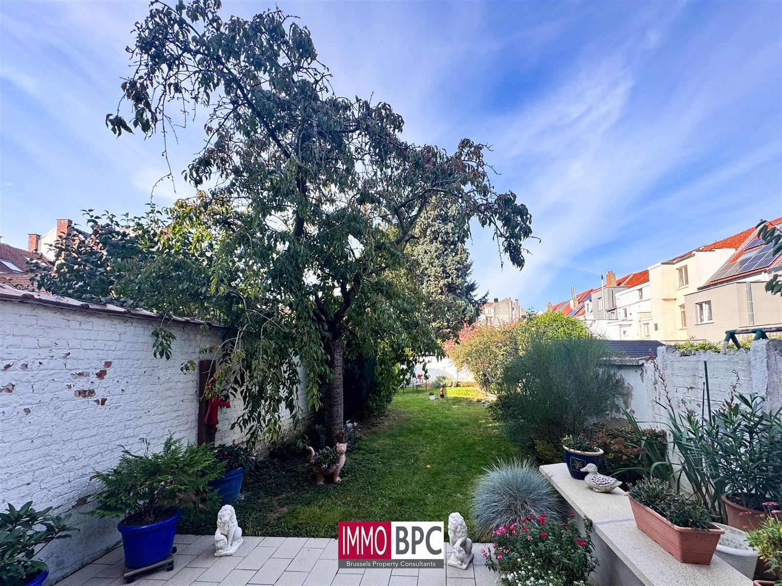 Charmante opbrengsteigendom of meergezinswoning met tuin, terrassen en garage in rustige straat van Anderlecht foto 7