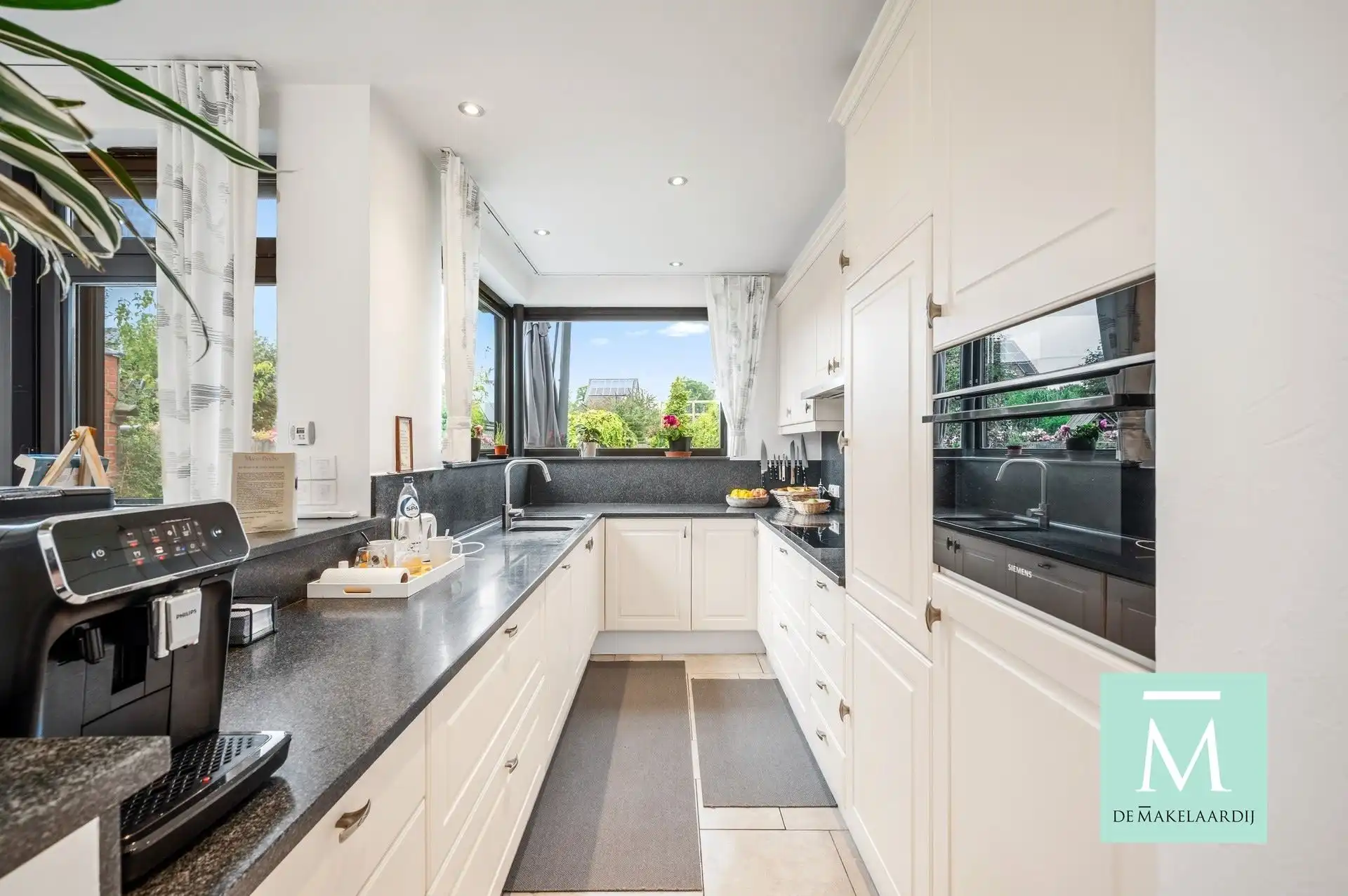 Volledig gerenoveerde woning met aangename tuin  foto 12