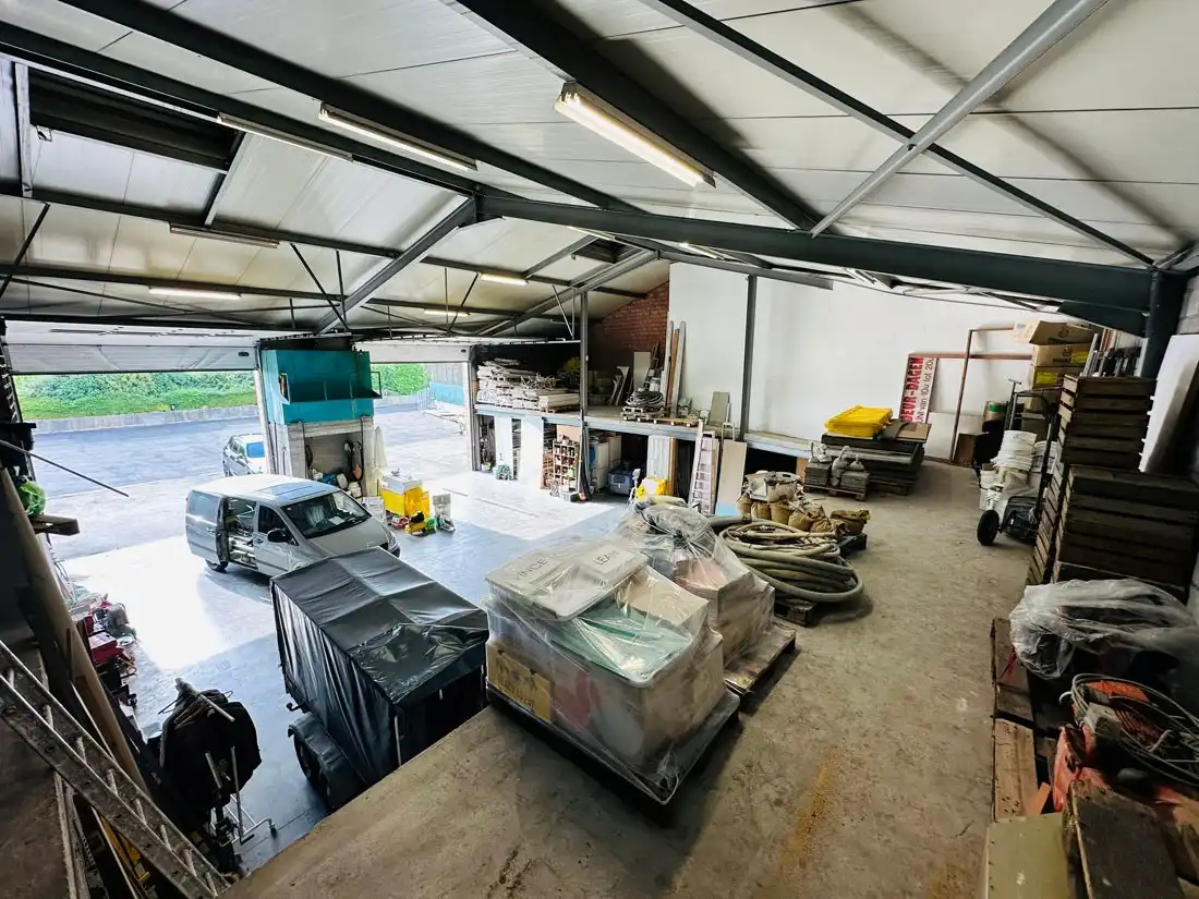 Ruim magazijn met kantoren met veel potentieel te Kuringen foto 25