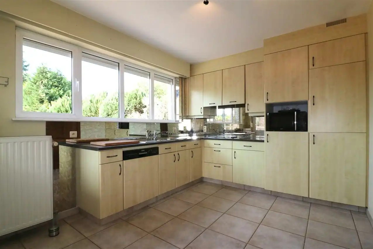 Gusting gelegen woning met 3 slp, garage en tuin foto 7