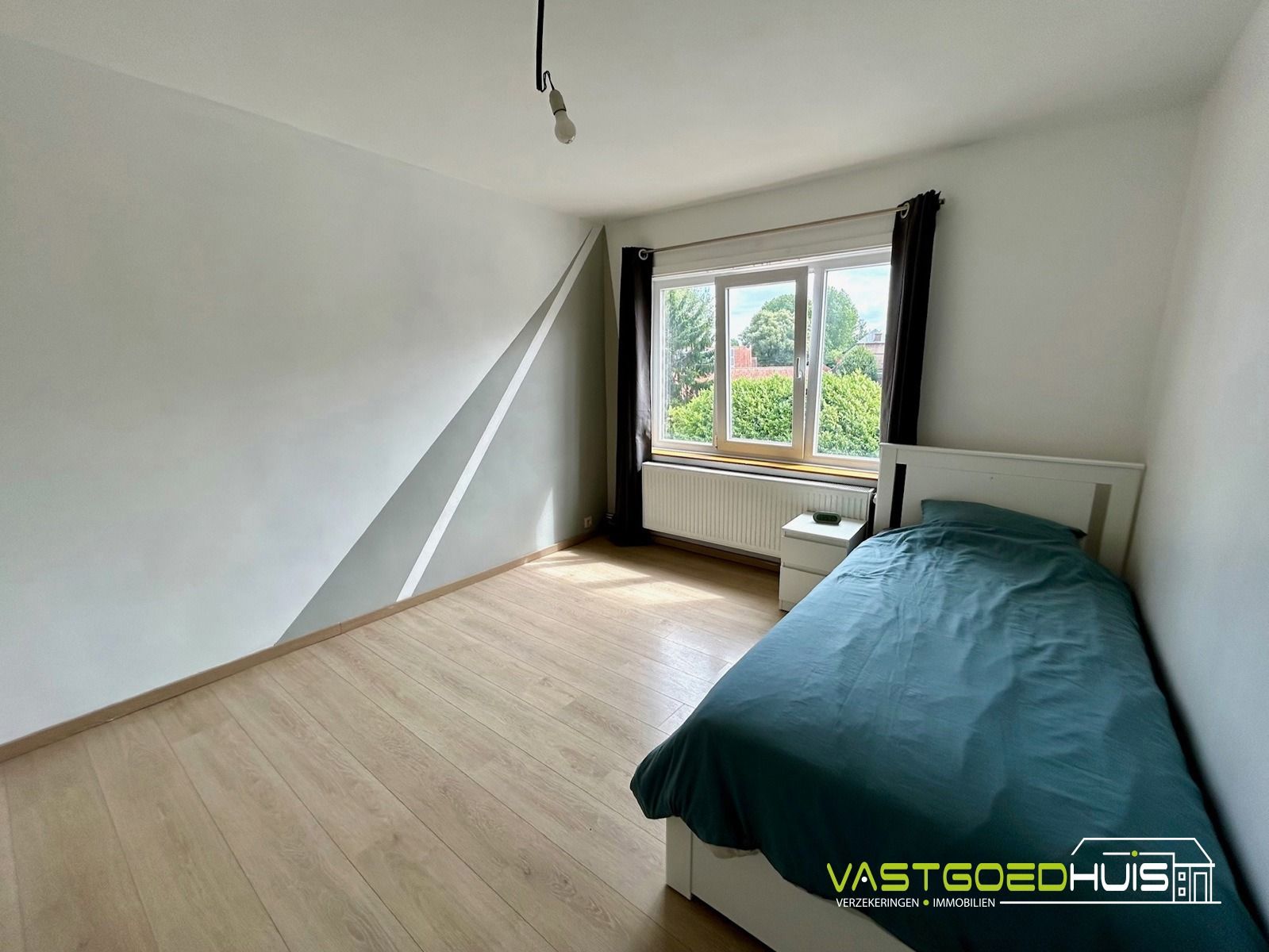 Ruime, instapklare gezinswoning met tuin foto 22