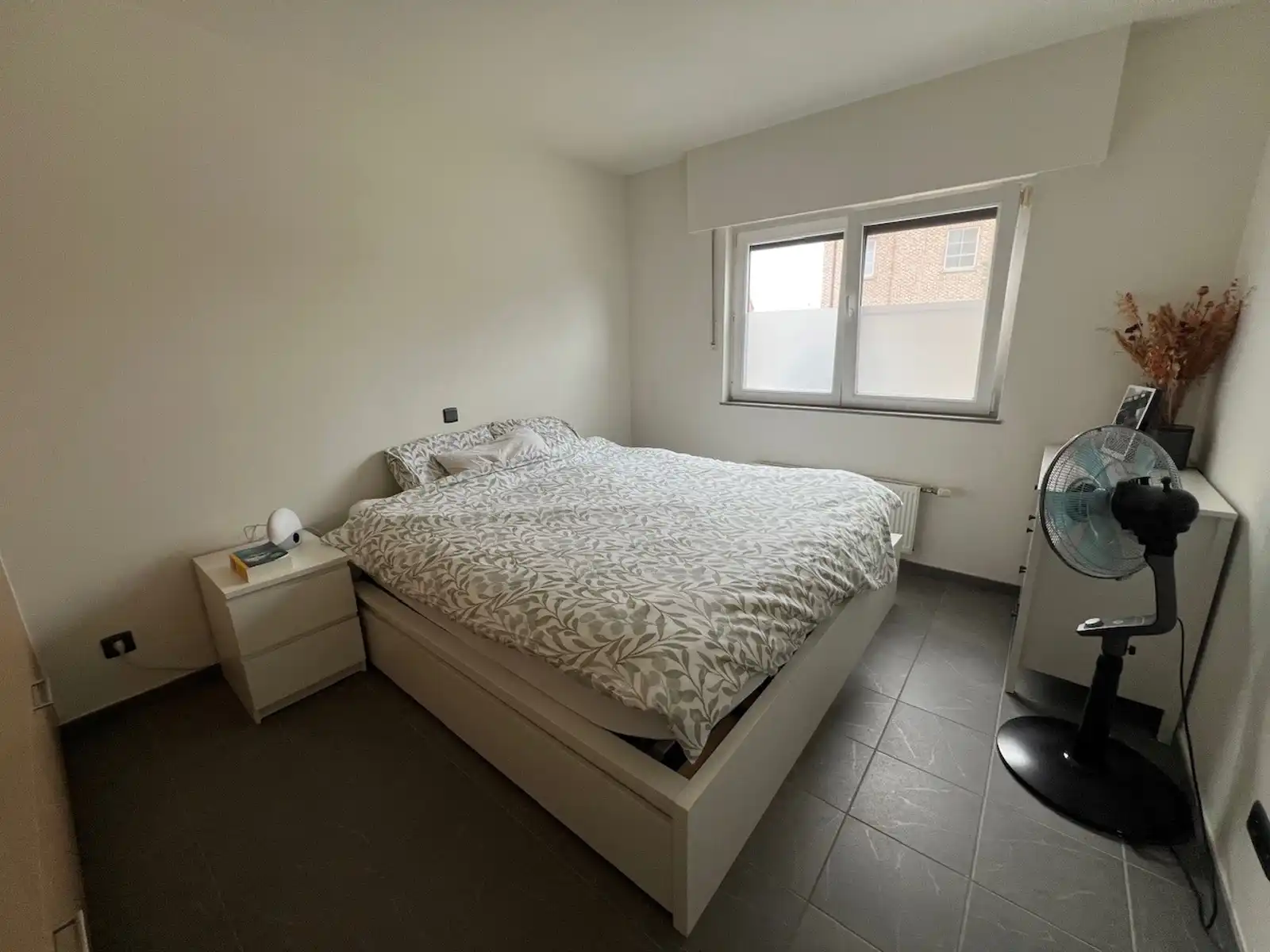 GLV app met 2 slpk, terras, tuin, parking en garagebox foto 14