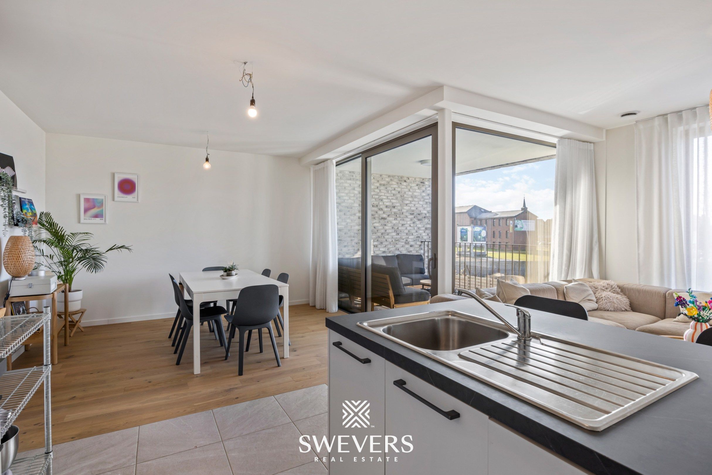 Recent 2 slpk- appartement met autostaanplaats en berging in centrum Beringen foto 12