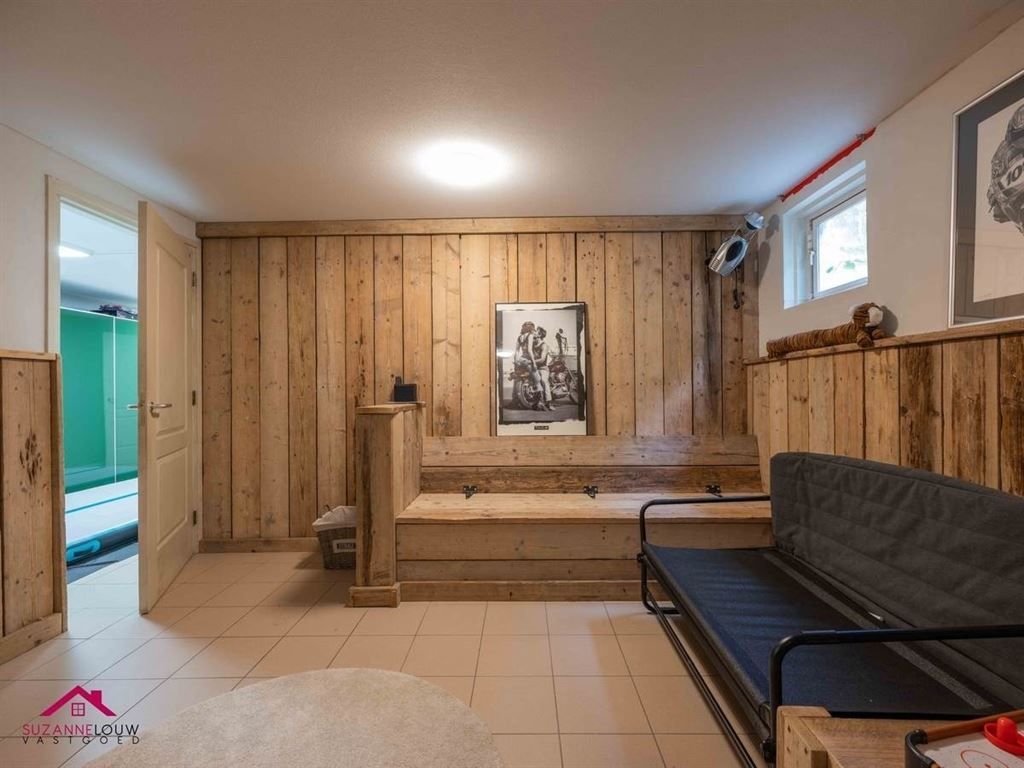 Landelijke villawoning met dubbele vrijstaande garage foto 65