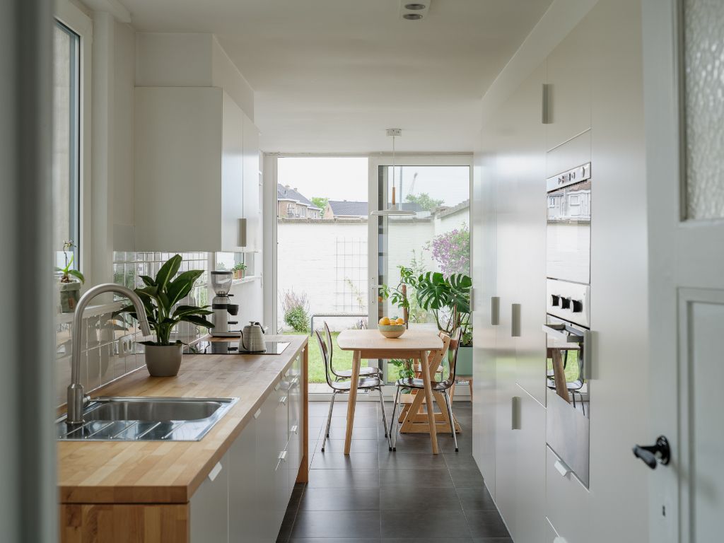 Instapklare en energiezuinige woning met 3 slaapkamers en aangename tuin, gelegen in een opkomende buurt aan de Muide. foto 2