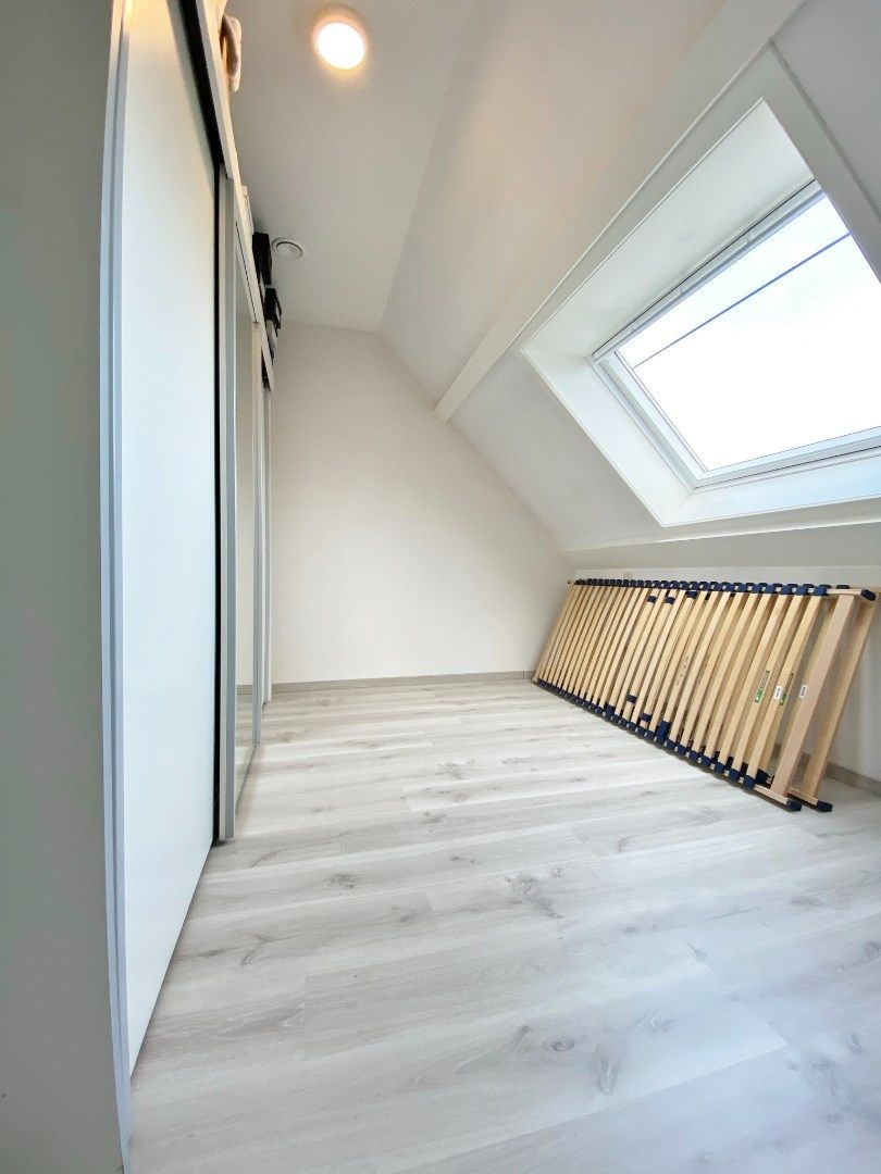 Recent vernieuwde woning met 4slpk, garage, zuidgerichte tuin & buitenberging foto 14