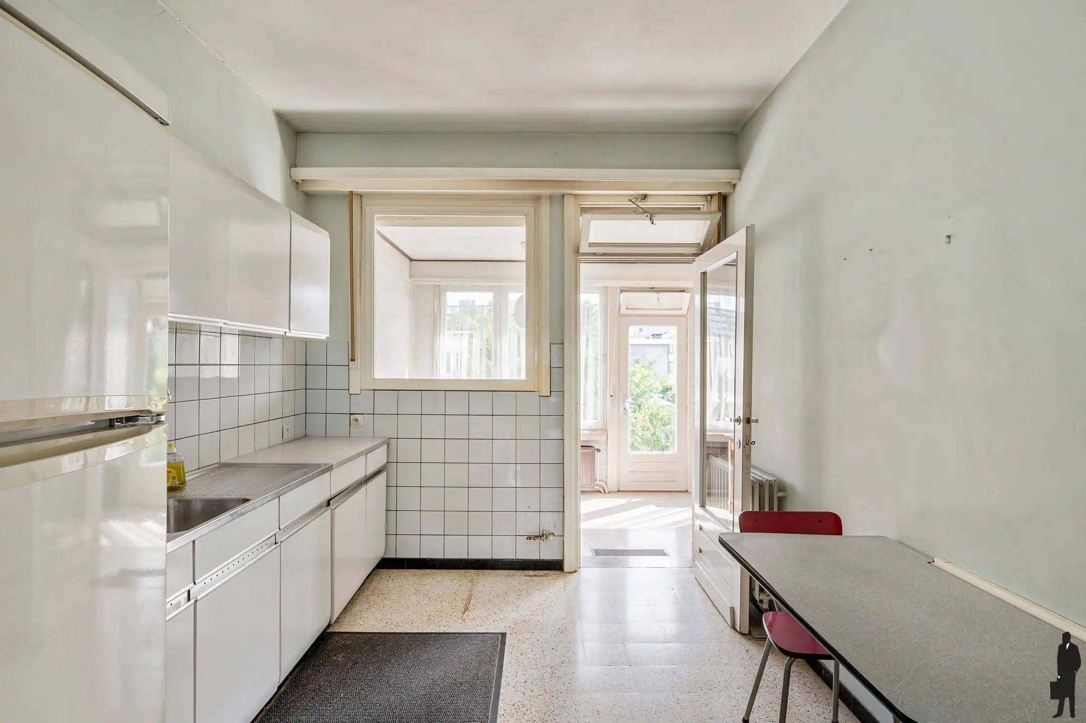 Te renoveren woning met garage én tuin foto 12