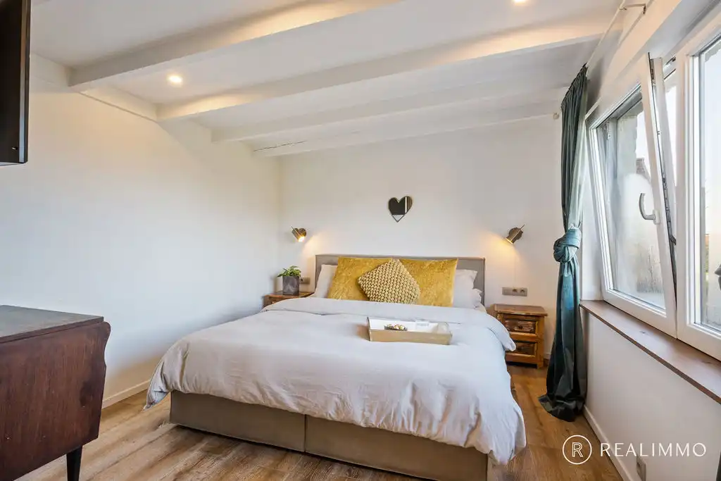 Stijlvol gerenoveerde woning met loods aan de voet van de Kluis! foto 19