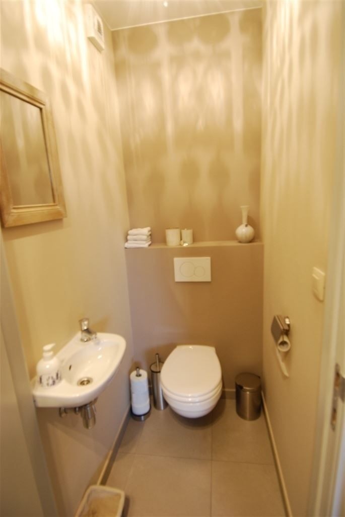 Gezellig appartement met 2 slaapkamers, 2 terassen, autostaanplaats en kelderberging in het centrum van Maaseik. foto 7