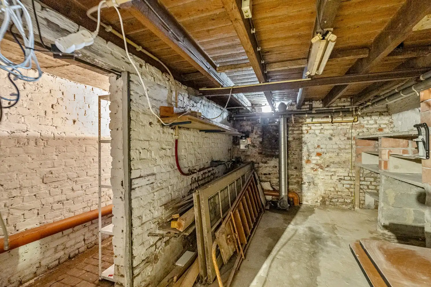Goed gelegen rijwoning met 2 slaapkamers en een af te werken zolderruimte te Leuven! foto 19