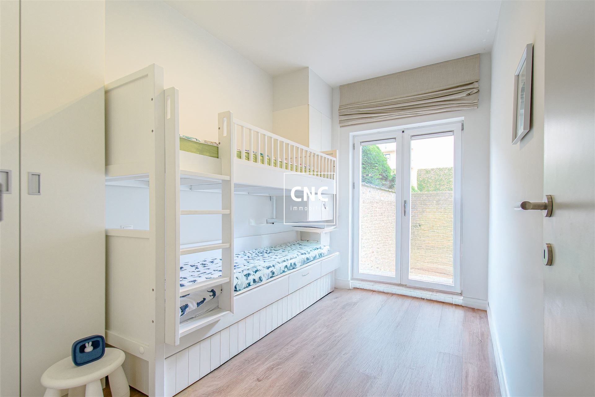 Gelijkvloers appartement met zonnige tuin nabij het centrum
 foto 9