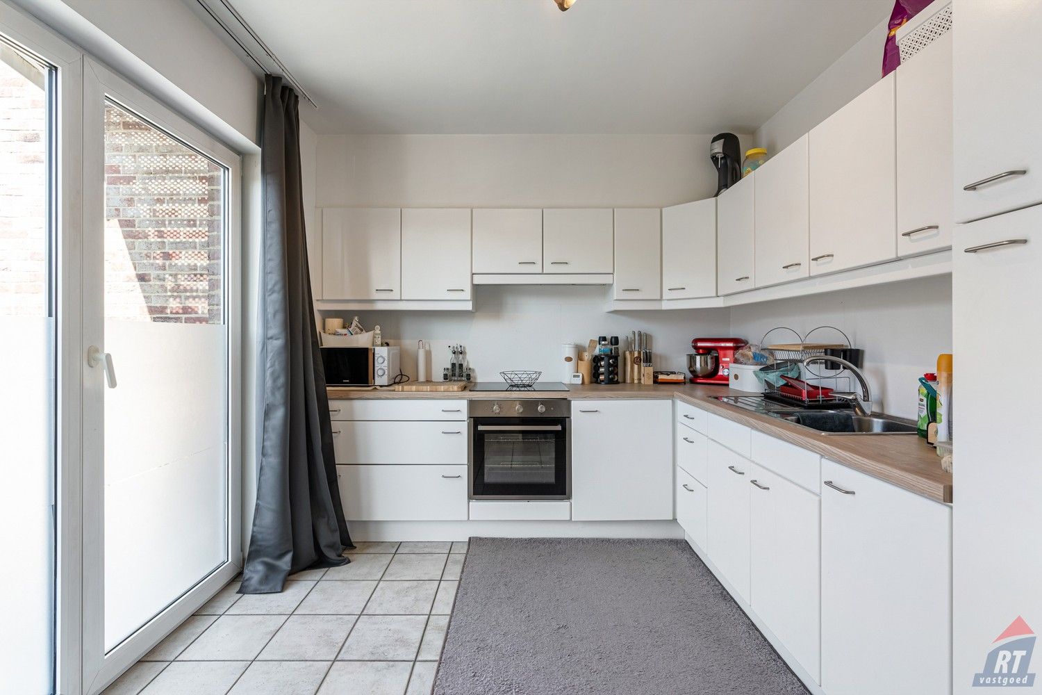 Lichtrijk en energiezuinig 2-slaapkamerappartement met terras in hartje Sint-Truiden foto 3
