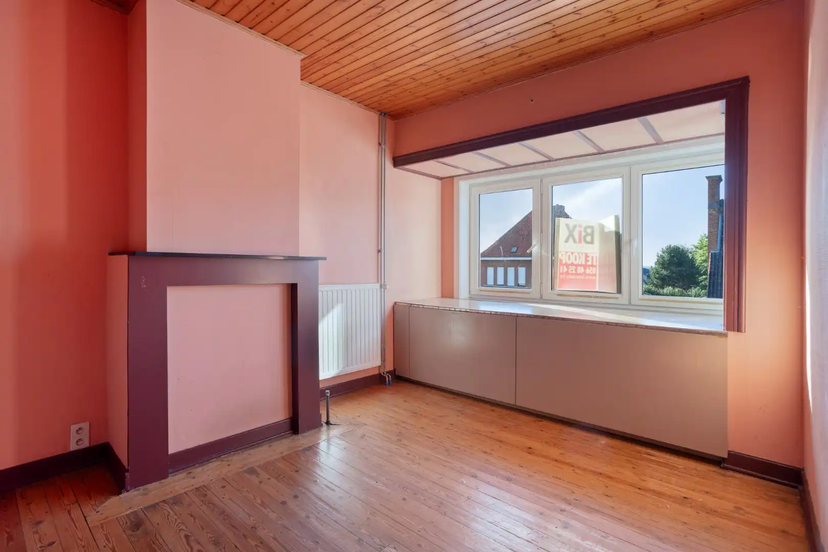 Verzorgde woning met diepe tuin, carport en uitweg achteraan! foto 13