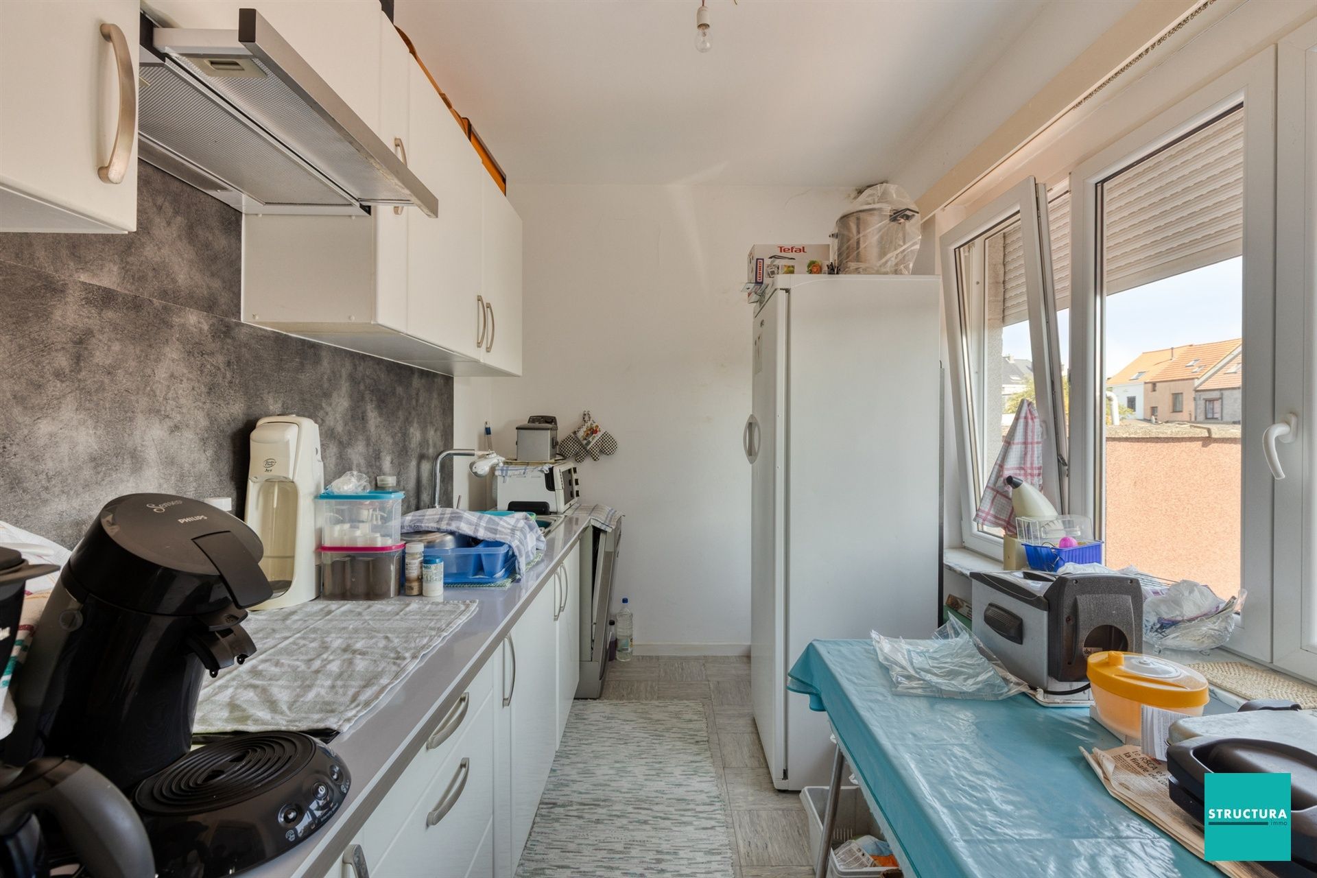 Opbrengsteigendom met 2 appartementen + 6 autostallingen foto 18