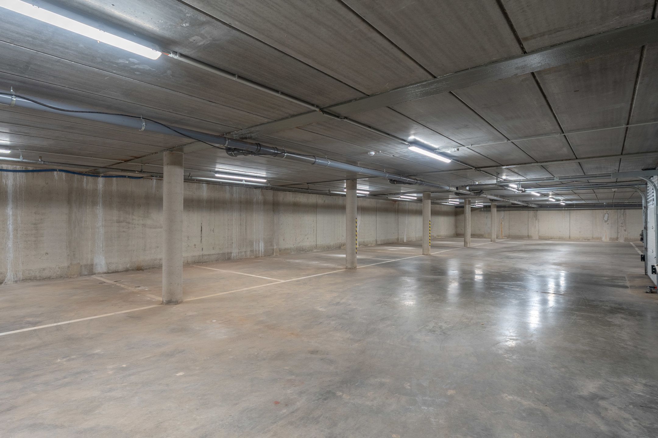 Zeer gunstig gelegen ondergrondse autostaanplaatsen te koop! foto 8