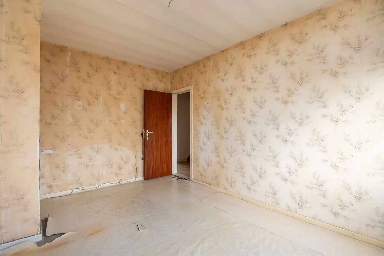 Te renoveren gezinswoning met tuin en garage in rustige centrumstraat foto 12