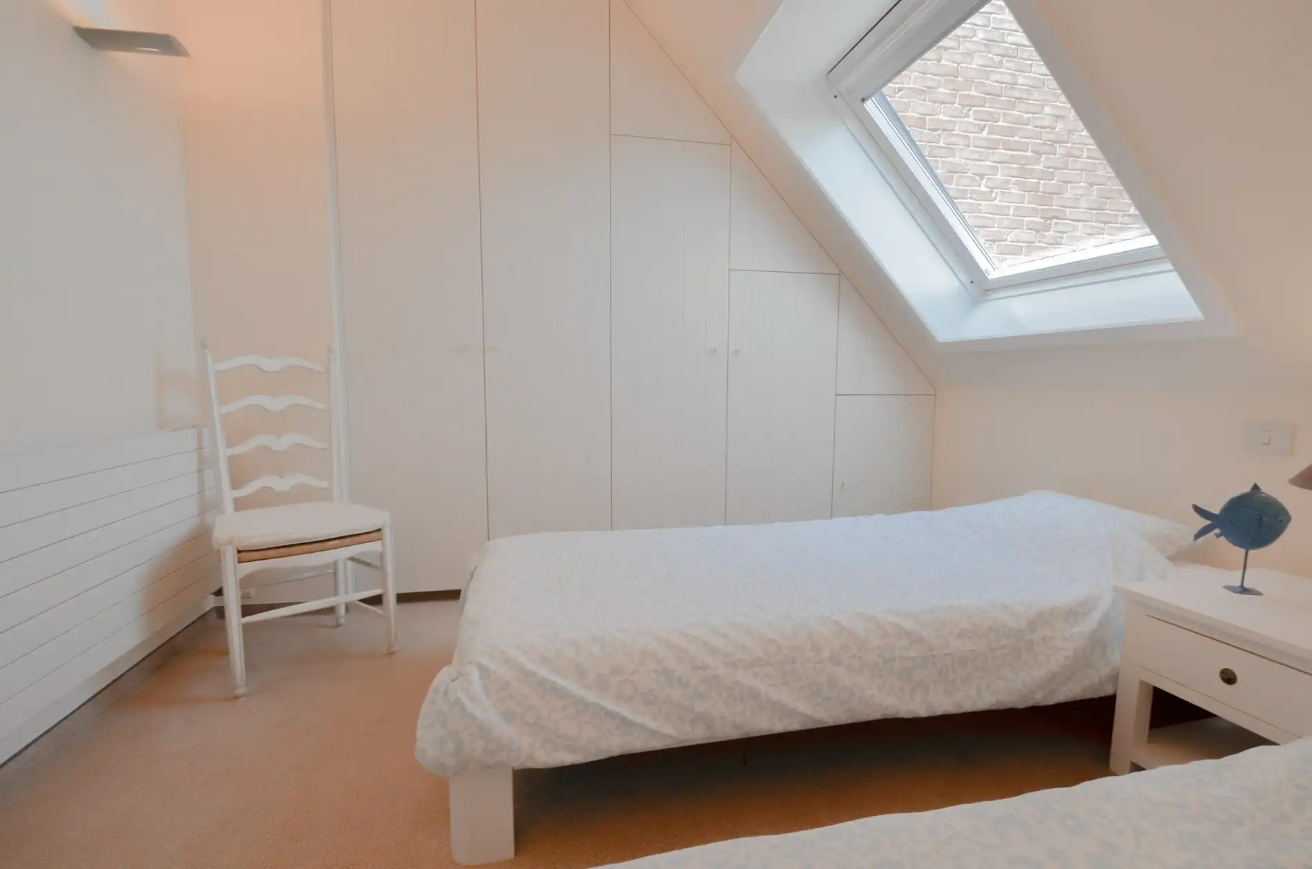 Stijlvol duplexappartement met zonnige terrassen en open zicht op de villa’s van het Zoute. foto 32