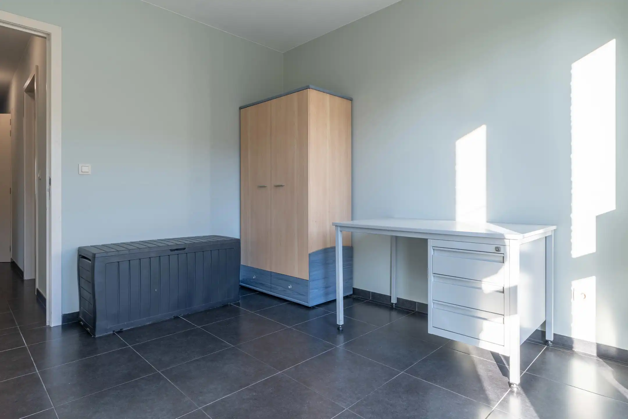 Instapklaar 2-slaapkamer appartement met terras en garagebox foto 17