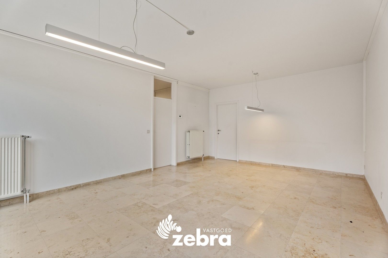 Veelzijdig handelspand op toplocatie in hartje Tielt – ook in te richten als woonst! foto 5