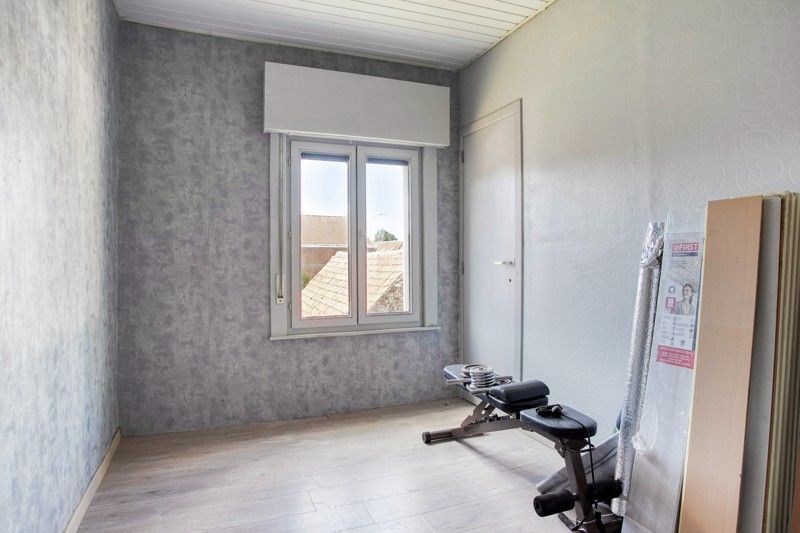 Gezellige woning met binnenkoer TE KOOP in het hart van Sint-Eloois-Vijve! foto 13