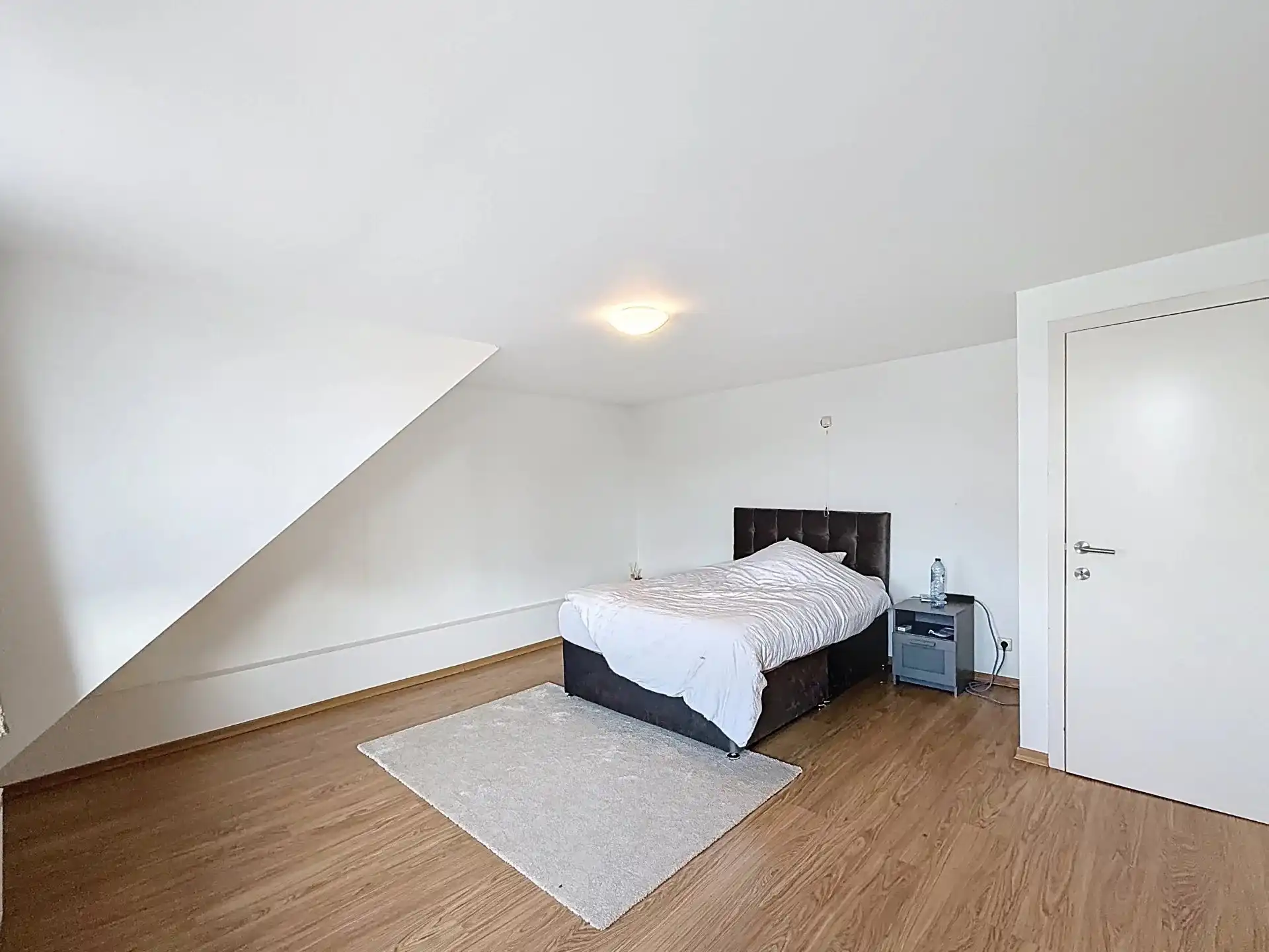 Handelspand met bovengelegen duplex-appartement in het centrum van Dessel. foto 17