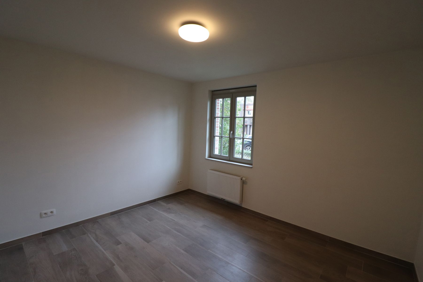 Prachtig appartement (2 slaapkamers met apart bureel) van 103m² op het gelijkvloers rechts met tuin en ondergrondse parkeerplaats. foto 18