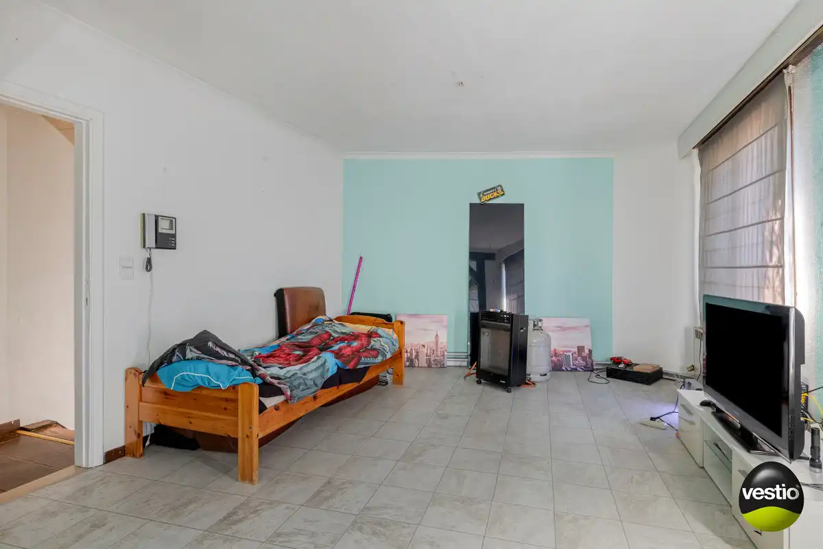 OPBRENGSTEIGENDOM VAN BUREEL, WONING, MAGAZIJN EN 2 APPARTEMENTEN TONGEREN LANGS N79. foto 39
