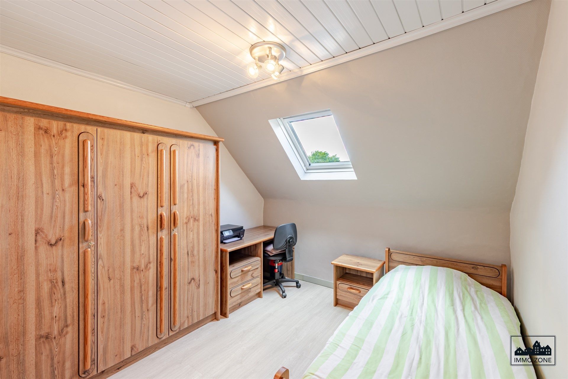 Ruime halfopen woning met uitbreidingspotentieel in Hamme! foto 12