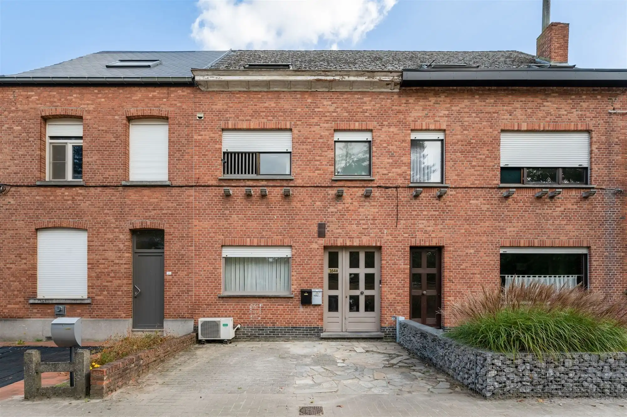 Deels gemoderniseerde woning in Sint-Katelijne-Waver foto {{pictureIndex}}