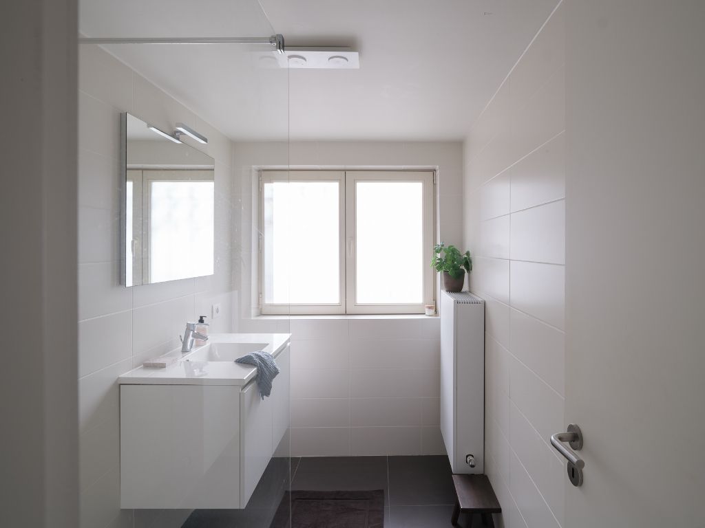 Wonen op niveau – duplex met karakter in centrum Gent foto 14