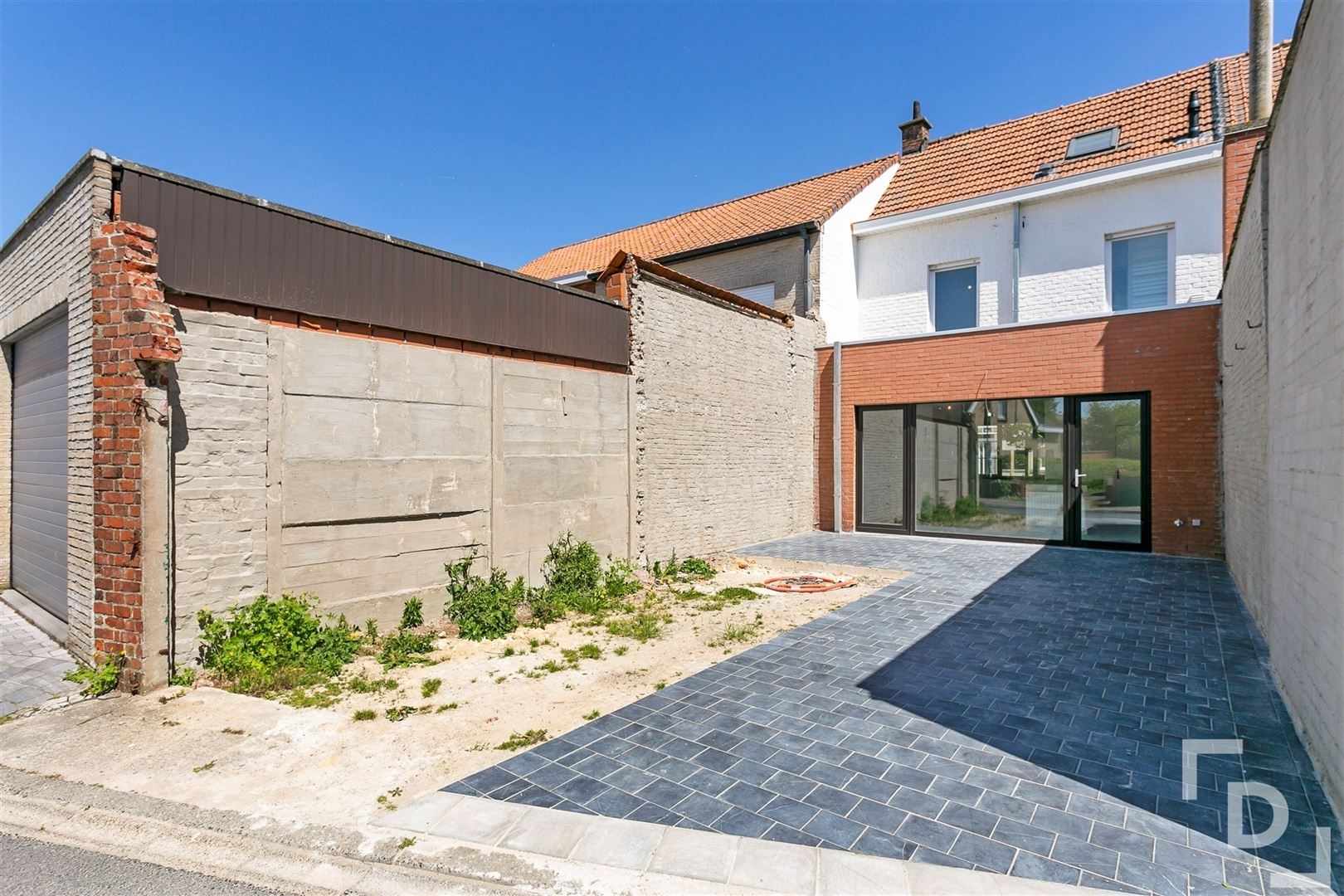 Instapklare rijwoning met uitgang achteraan foto 8