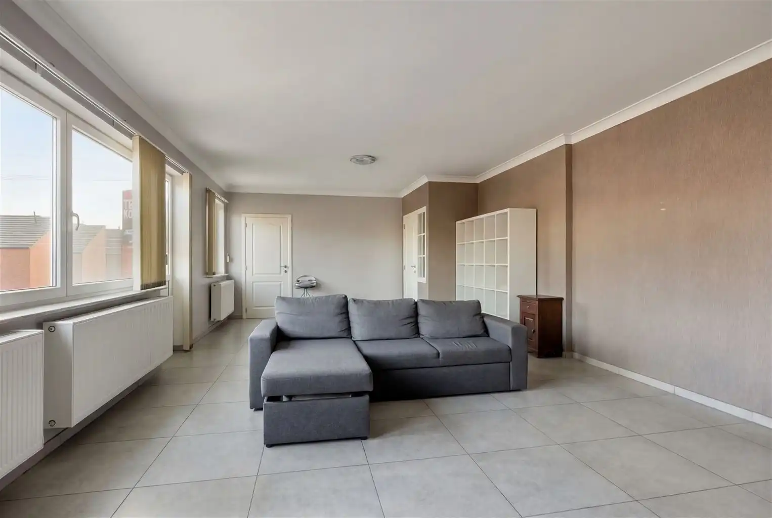 Zeer ruim 4-slaapkamerappartement met ruime terrassen en een afgesloten garage, gelegen nabij het centrum van Maaseik. foto 4