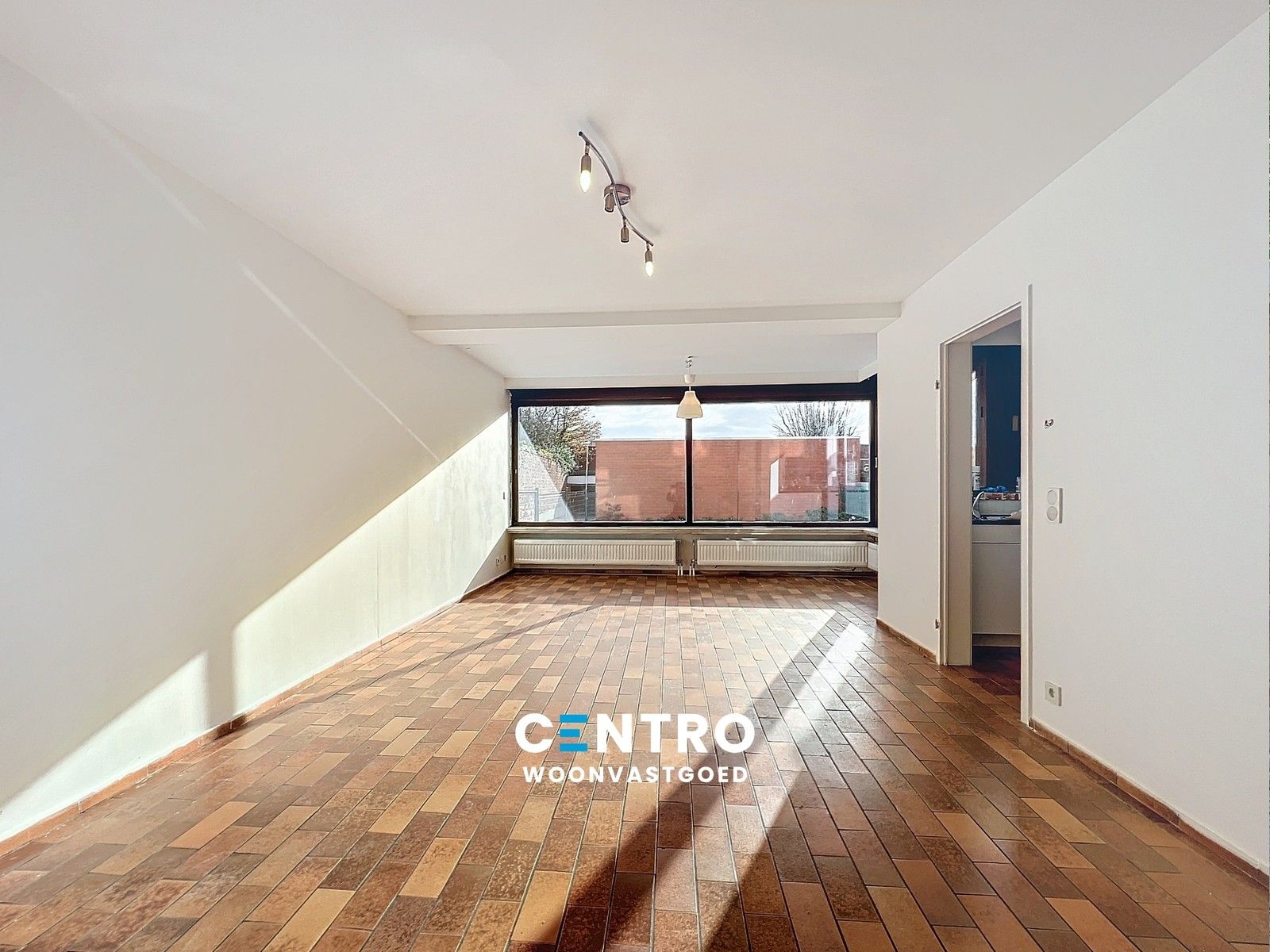 Hoofdfoto van de publicatie: Betaalbaar app. (85m²) met 2 slpks, kelderberging en TERRAS van 50m² !