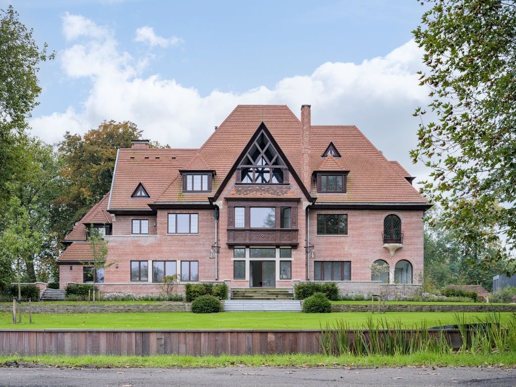 Exclusief wonen aan de oevers van de Leie in Sint-Denijs-Westrem foto {{pictureIndex}}