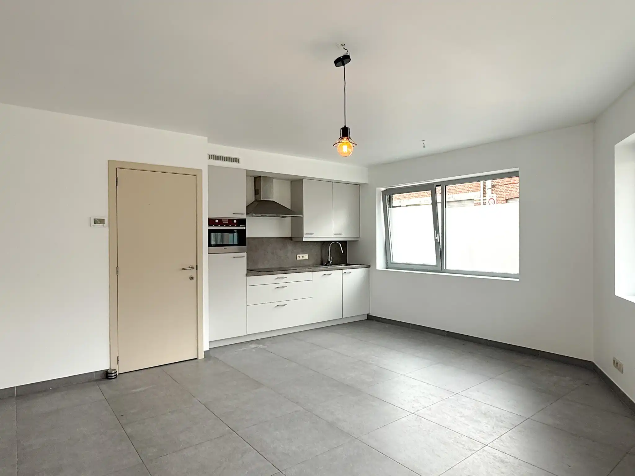 Gelijkvloers appartement met 2 slaapkamers en autostaanplaats foto 3