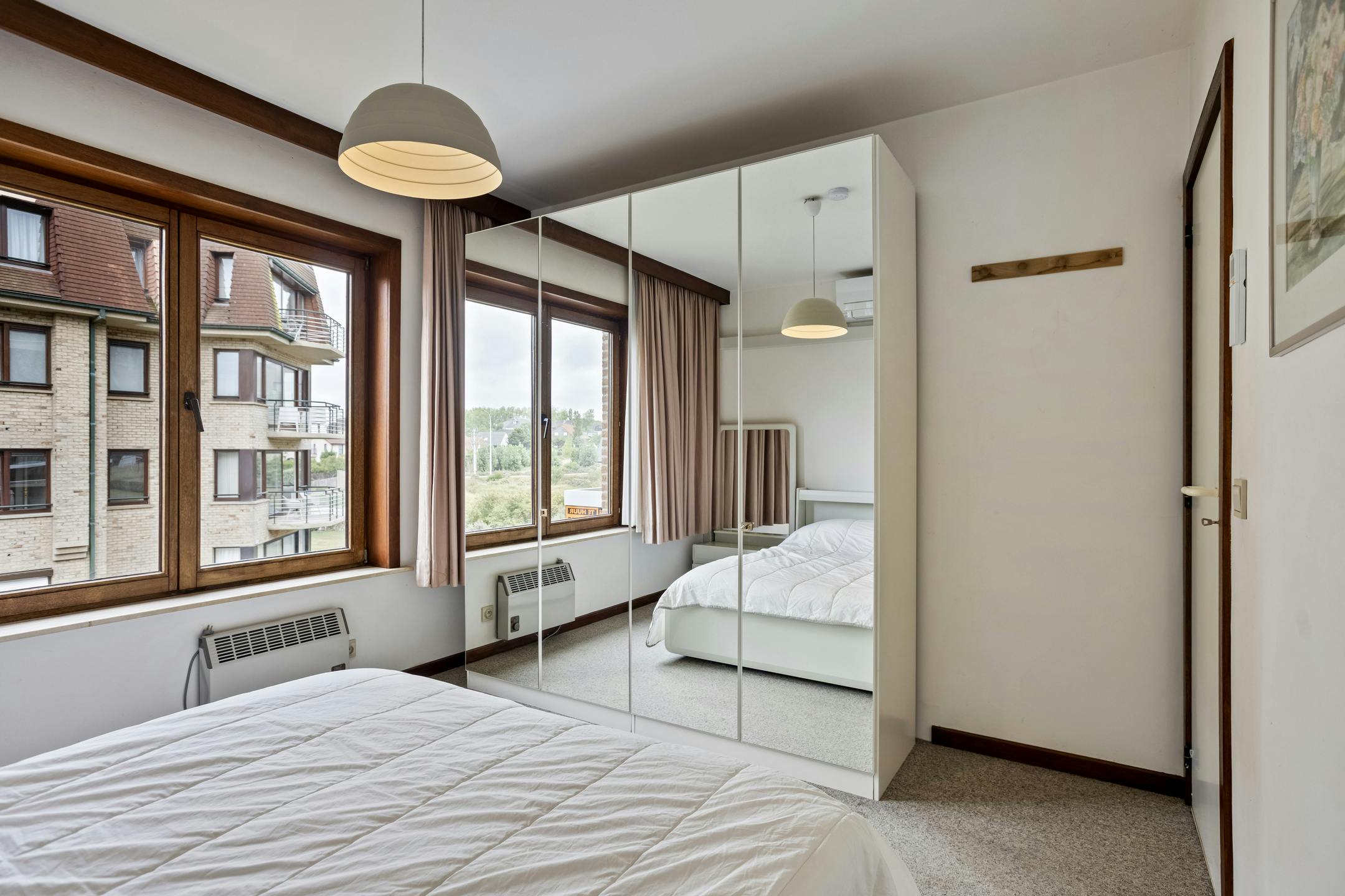 Zonnig hoekappartement met 2 slaapkamers en mooi groen zicht foto 10
