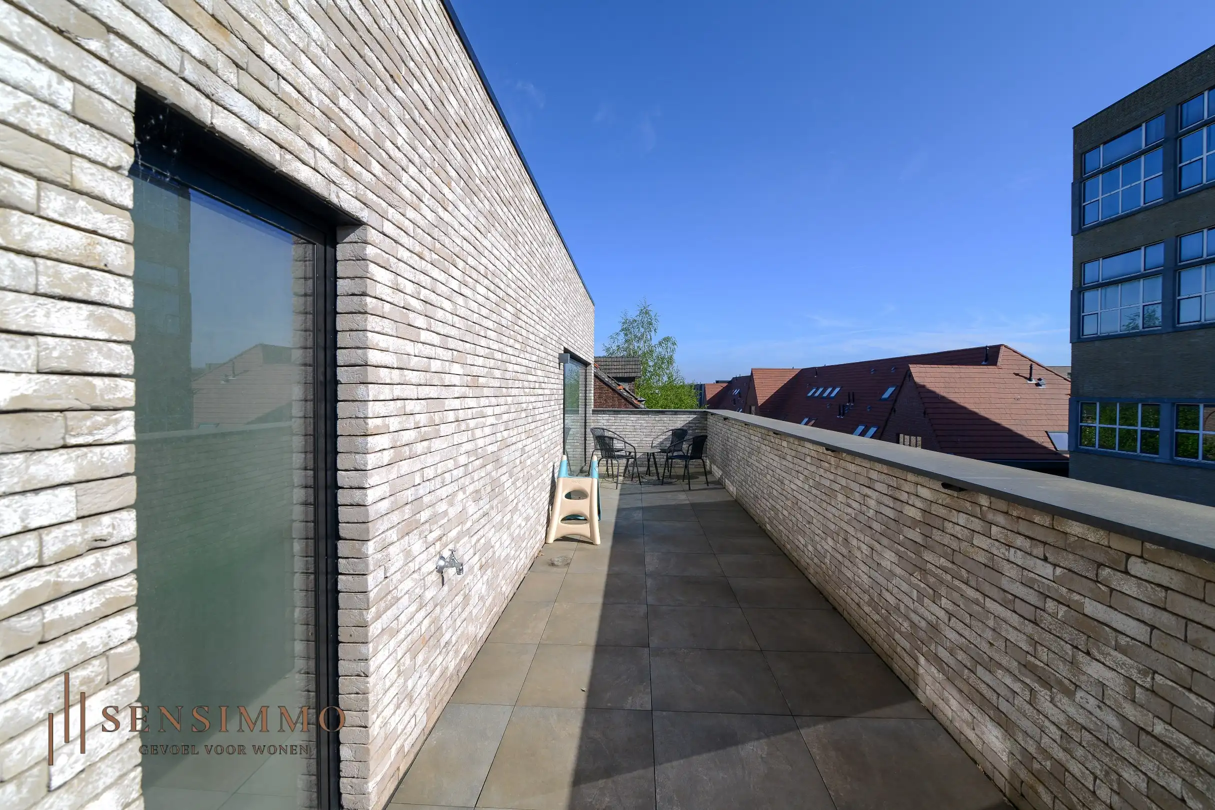 Instapklaar & energiezuinig 1-slaapkamerappartement met 2 terrassen en parking in Maasmechelen foto 15