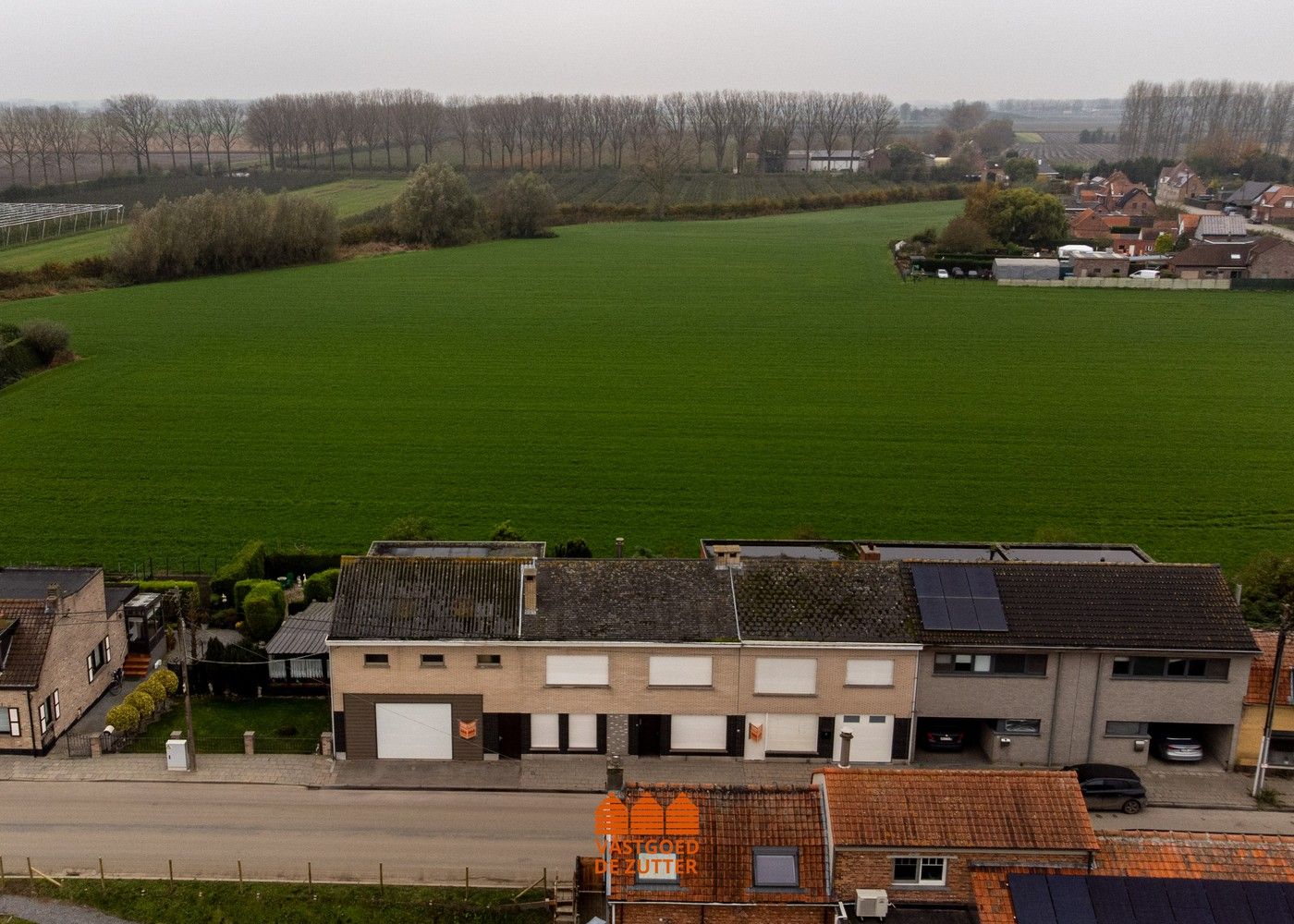 Uniek aanbod: twee ruime woningen met loods en winkel foto 7