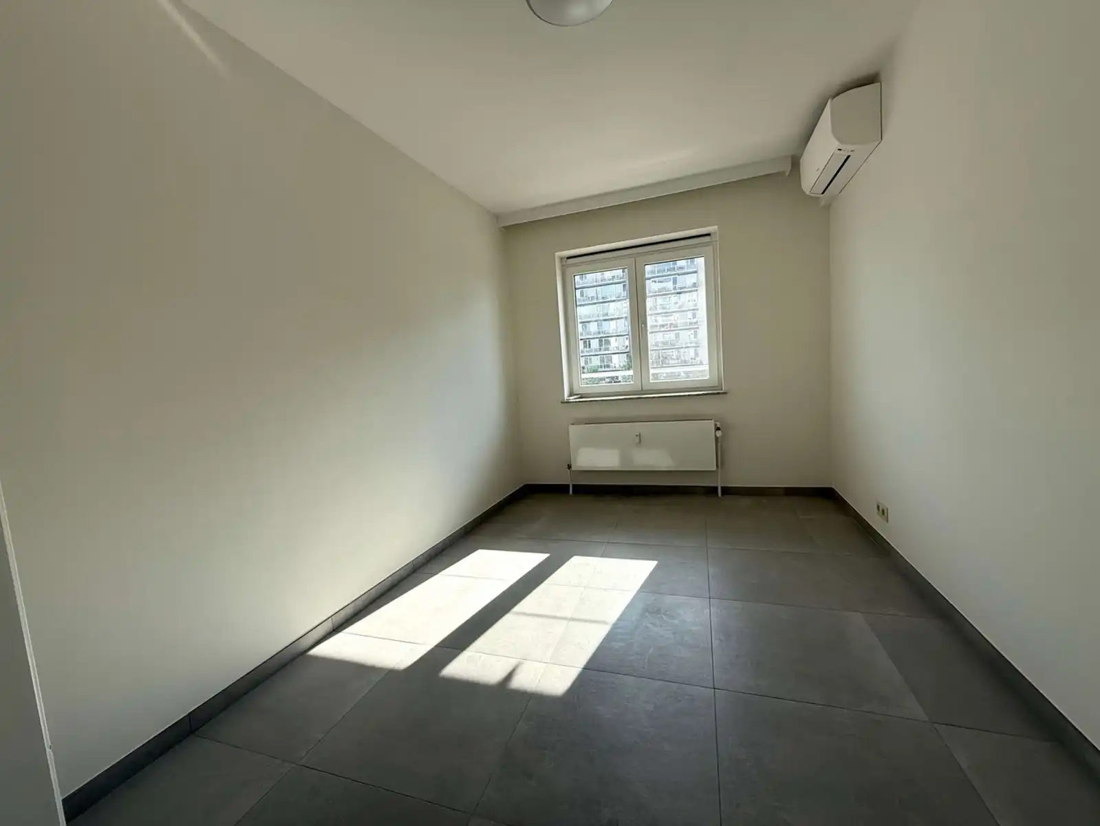 Volledig gerenoveerd appartement met 2 slaapkamers en ruim zonneterras te huur in Heverlee (Leuven) foto 10