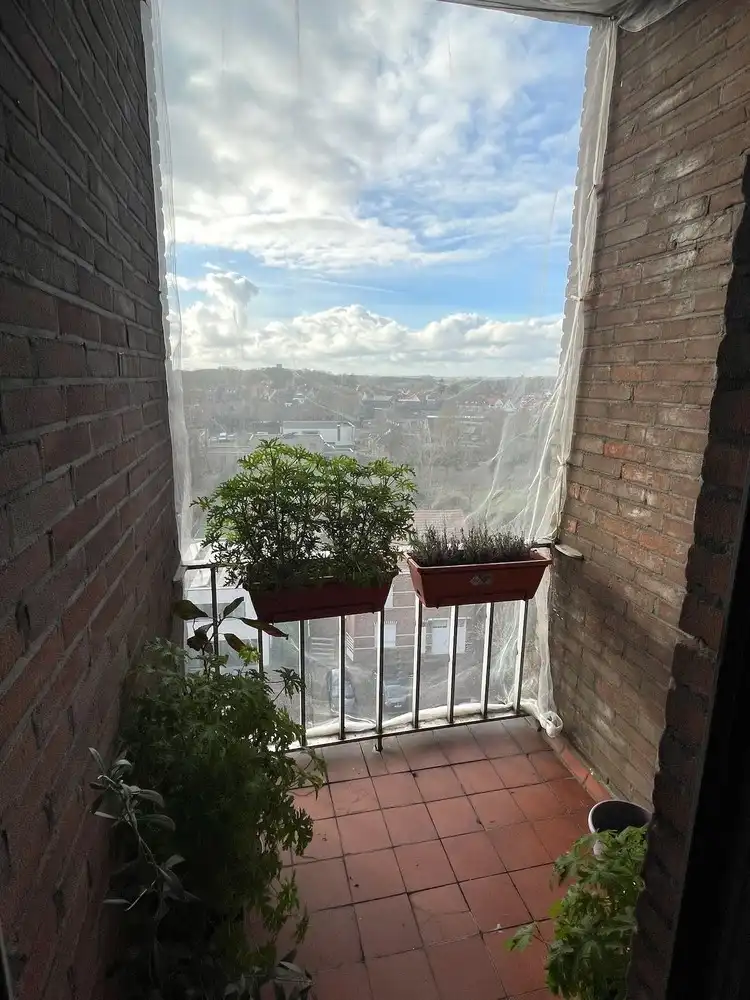 Gezellig en instapklaar appartement met loftgevoel, garagebox en prachtig uitzicht foto 7