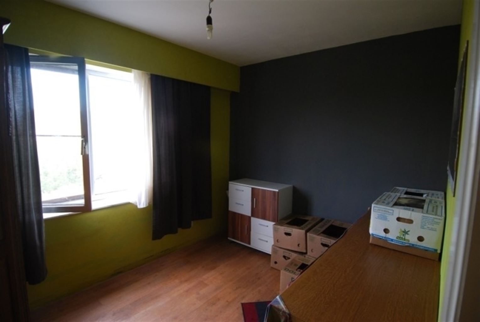 Ruim appartement met 3 slaapkamers en garagebox, gelegen in een rustige, kindvriendelijke omgeving. foto 6