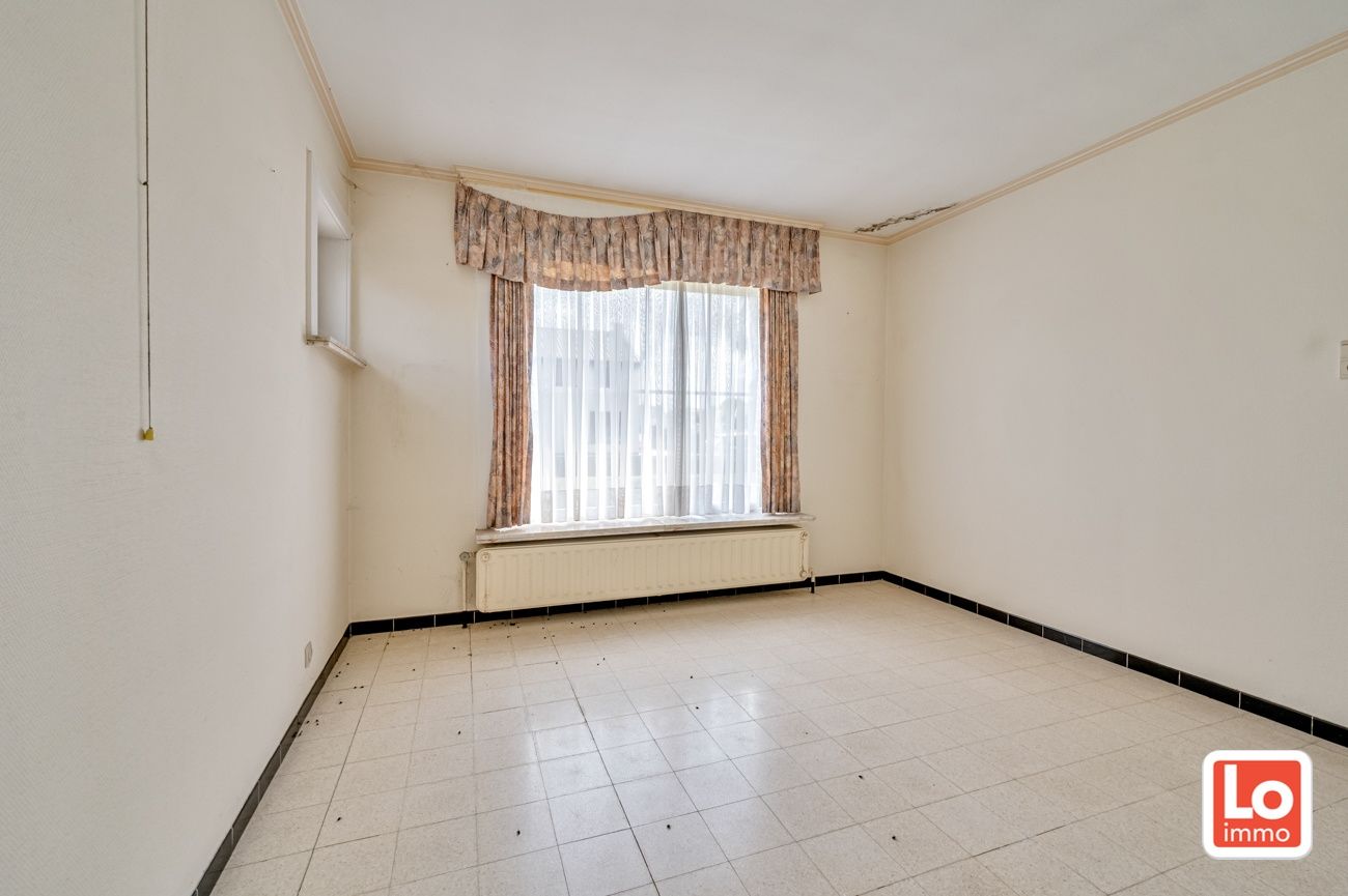 Statige open woning met ruim bijgebouw op groot perceel grond in het centrum van Kalken! foto 16