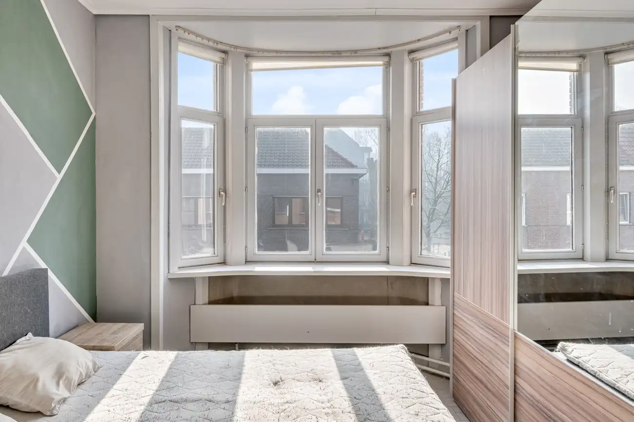 Charmante gesloten (kangoeroe)woning met heel wat potentieel op een gegeerde locatie in Oostakker! foto 13