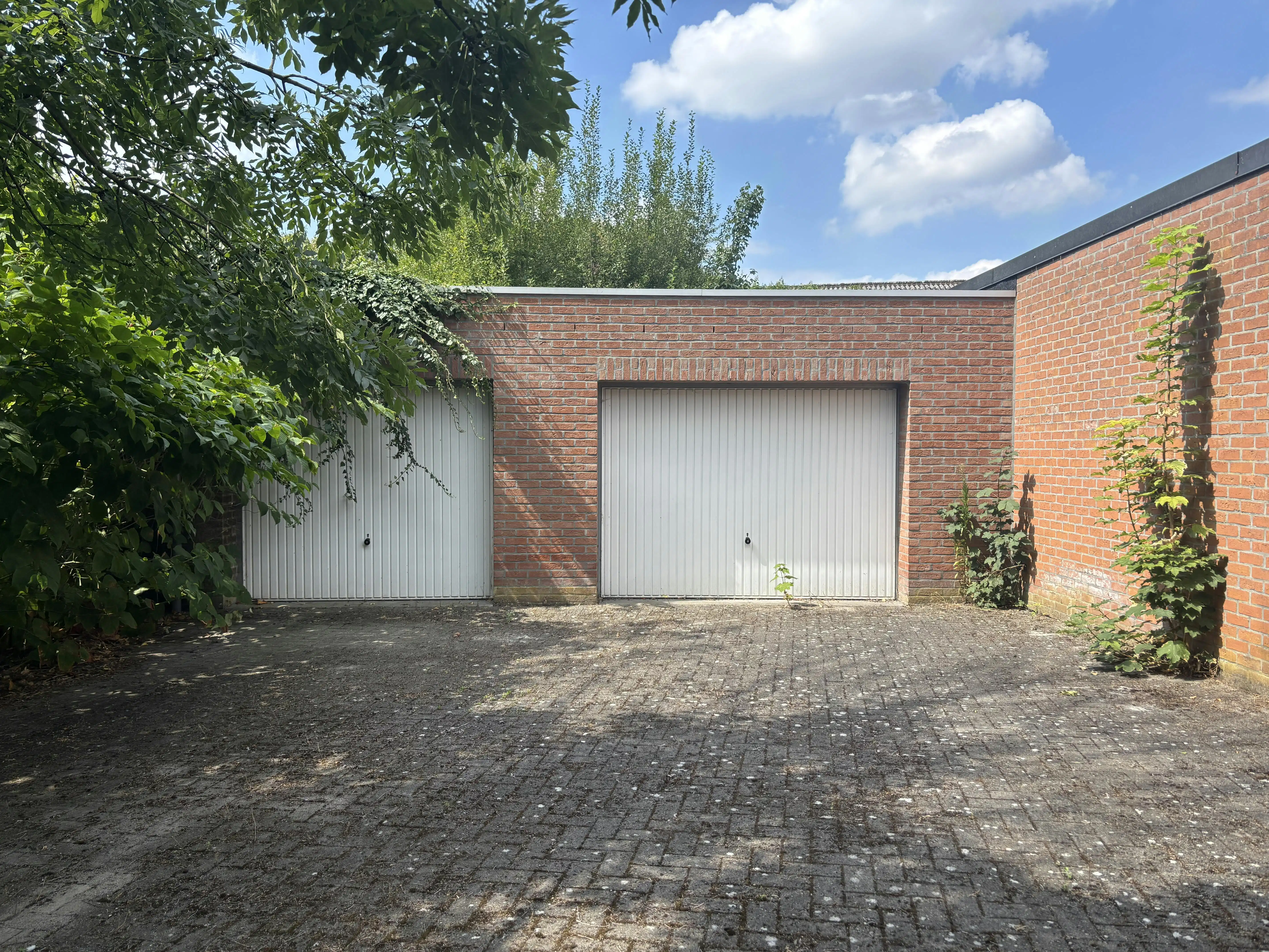 Handelspand met woonst te koop in centrum Brecht! foto 24