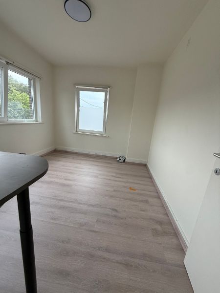 Leuke woning met tuintje en zicht op water foto 6