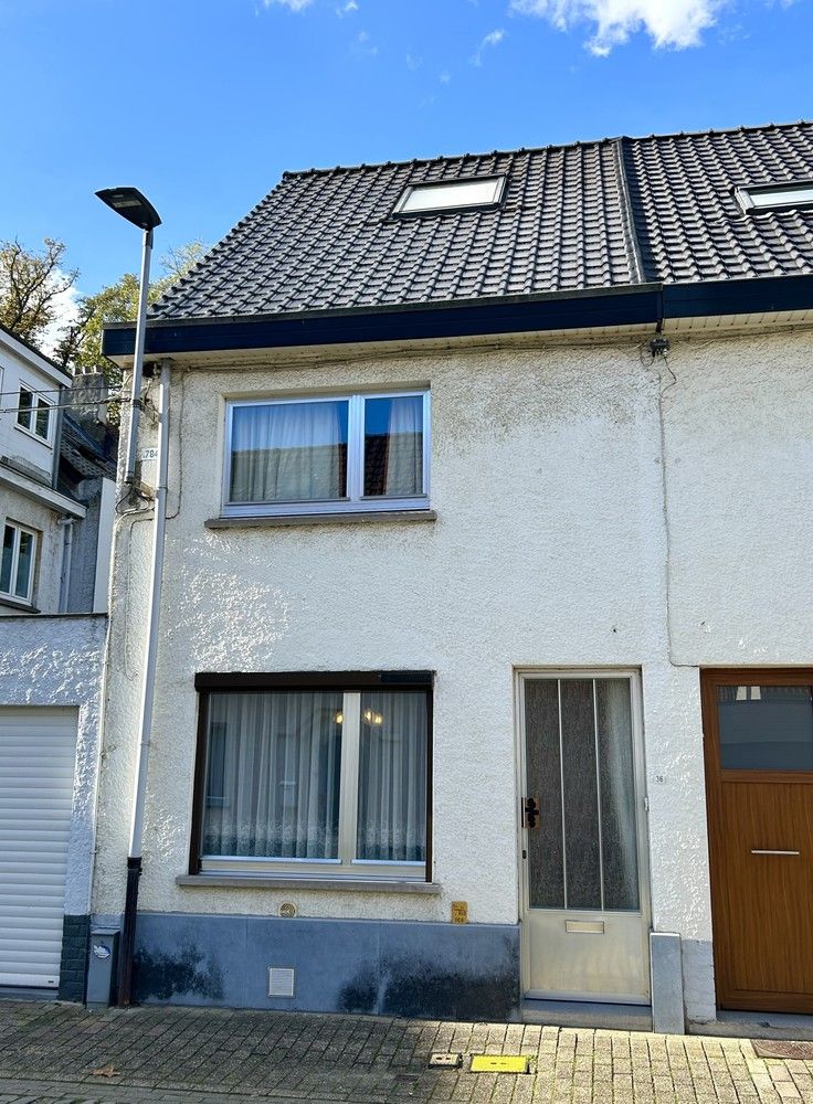 Te renoveren woning in centrum Leuven met garage en binnenkoer! foto 1