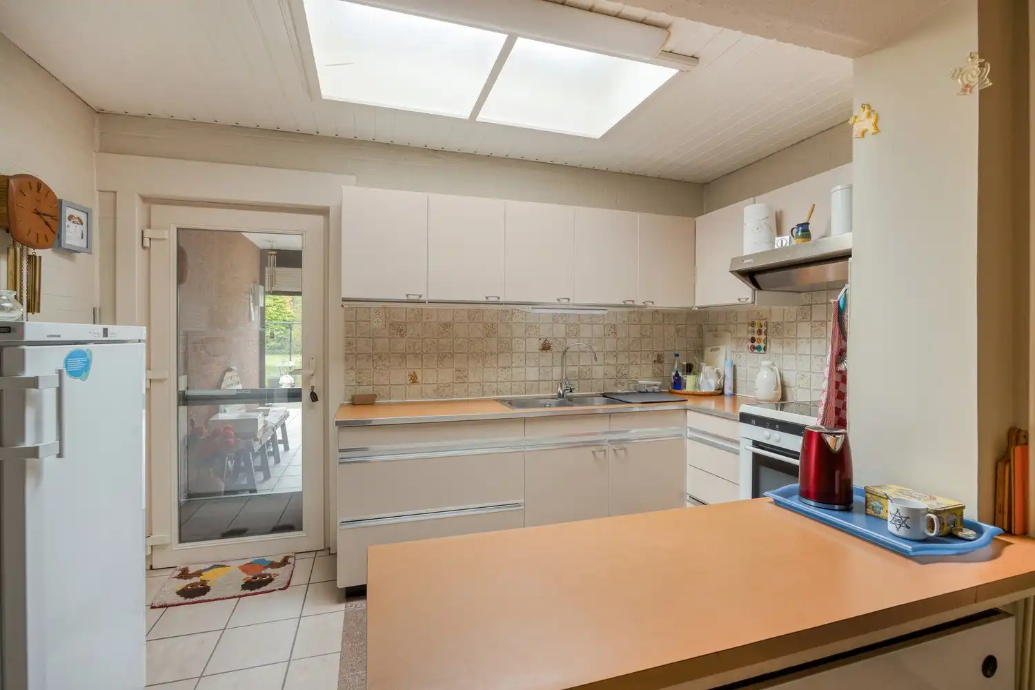 Gezinswoning met 4 slaapkamers en aangelegde tuin in doodlopende straat foto 12